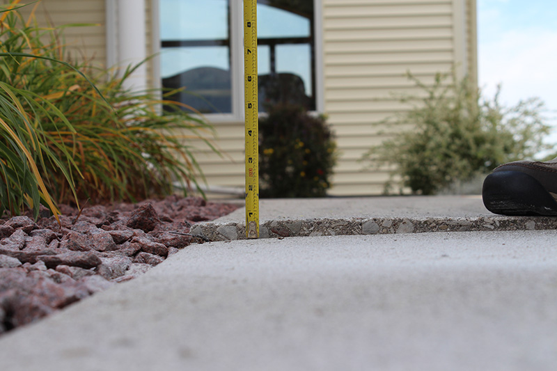 Walkway concrete lifting - before