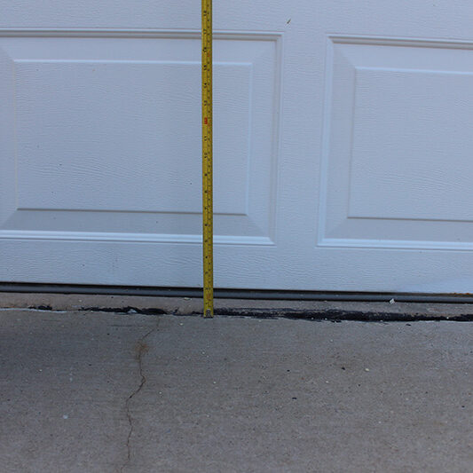 Garage door concrete lifting project - after
