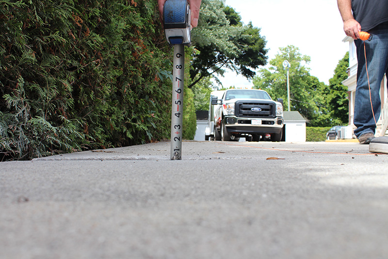 sidewalk concrete lifting project - before