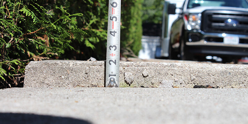 sidewalk concrete lifting project - before