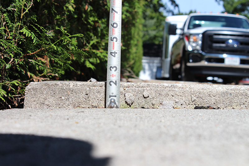 sidewalk concrete lifting project - before